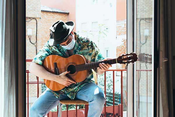 bohemian-musician-with-mask-on-his-face-