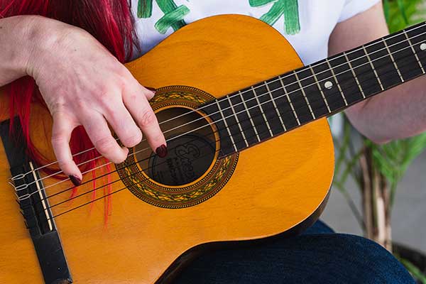 woman-playing-spanish-guitar