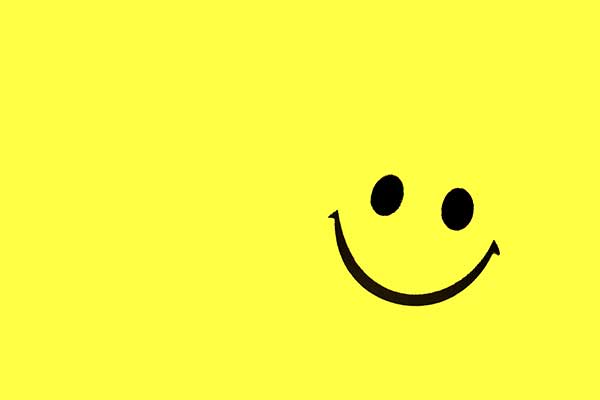 smiling-face-cartoon-on-yellow-background
