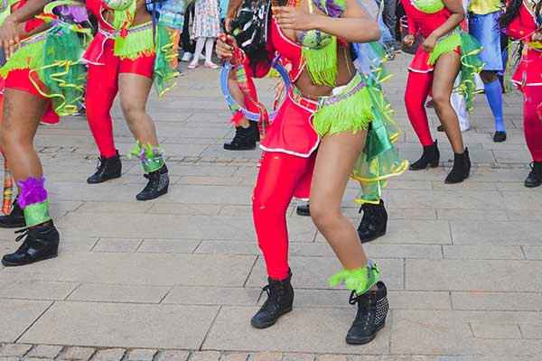 the-caribbean-women-dancing-in-costumes-in-downtow